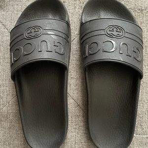 Gucci logo slides